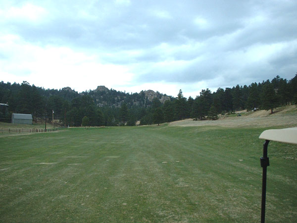 What a way to tee off- a fairway with mountains in the background.jpg 65.0K